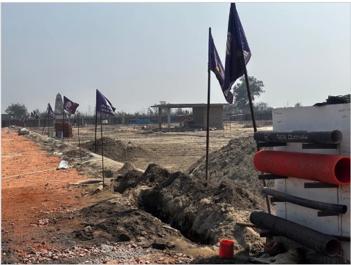 Plotted land with boundary flags and site development